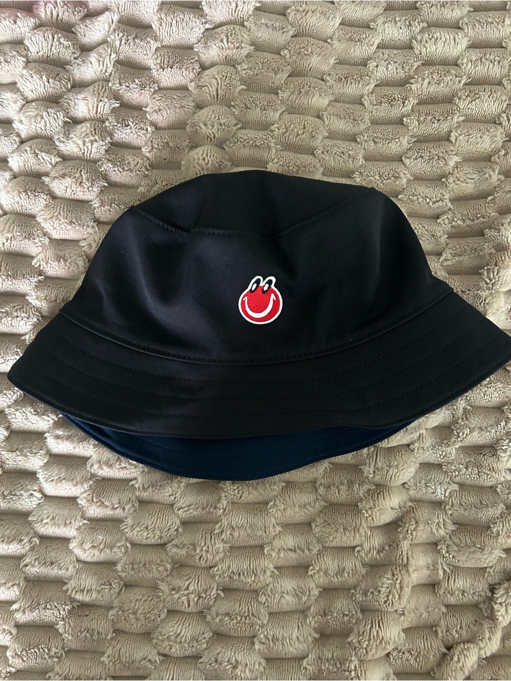 lululemon athletica Black Bucket Hat with Red Smiley Patch